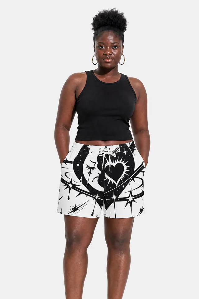 Cosmic Heartbreak Board Shorts on model